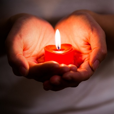 sacred heart hand and candle