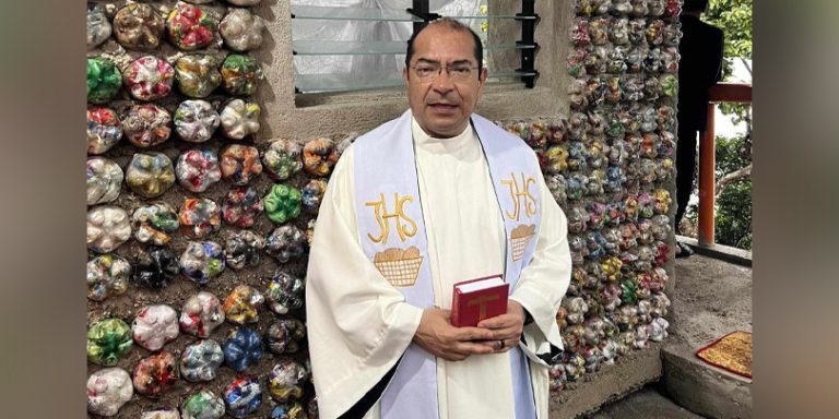 0423phil Fr Mario Abzalon Alvardao Tovar MSC stands outside a chapel made from ecobricks Missionaries of the Sacred Heart 768x384