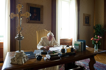 Pope Benedict XVI is pictured at his desk in the papal residence at Castel Gandolfo, Italy, in this 2010 photo. (CNS photo/Vatican Media)